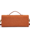 Tan woven rectangular handbag with top handle and detachable strap