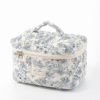 Blue floral toile quilted cosmetic case with carry handle