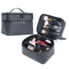 Black cosmetic case shown closed and open with brushes and cosmetics