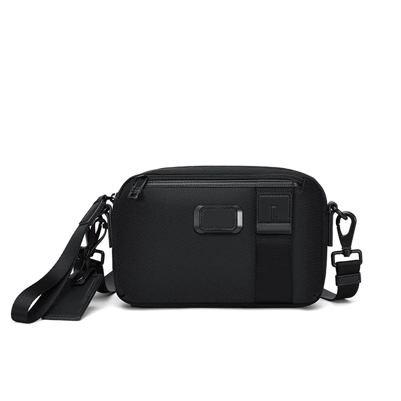 A black camera bag displayed on a clean white background, highlighting its design and features.
