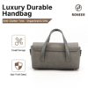 Rear view of grey flap handbag