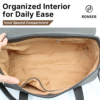 Open grey handbag with tan lining