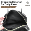 Open black handbag showing inner pocket